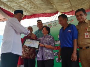 Kopsyah BMI Hibahkan RSH ke 100 kepada WNI Turunan Tionghoa.