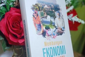 MEMBANGUN EKONOMI MANUSIAWI