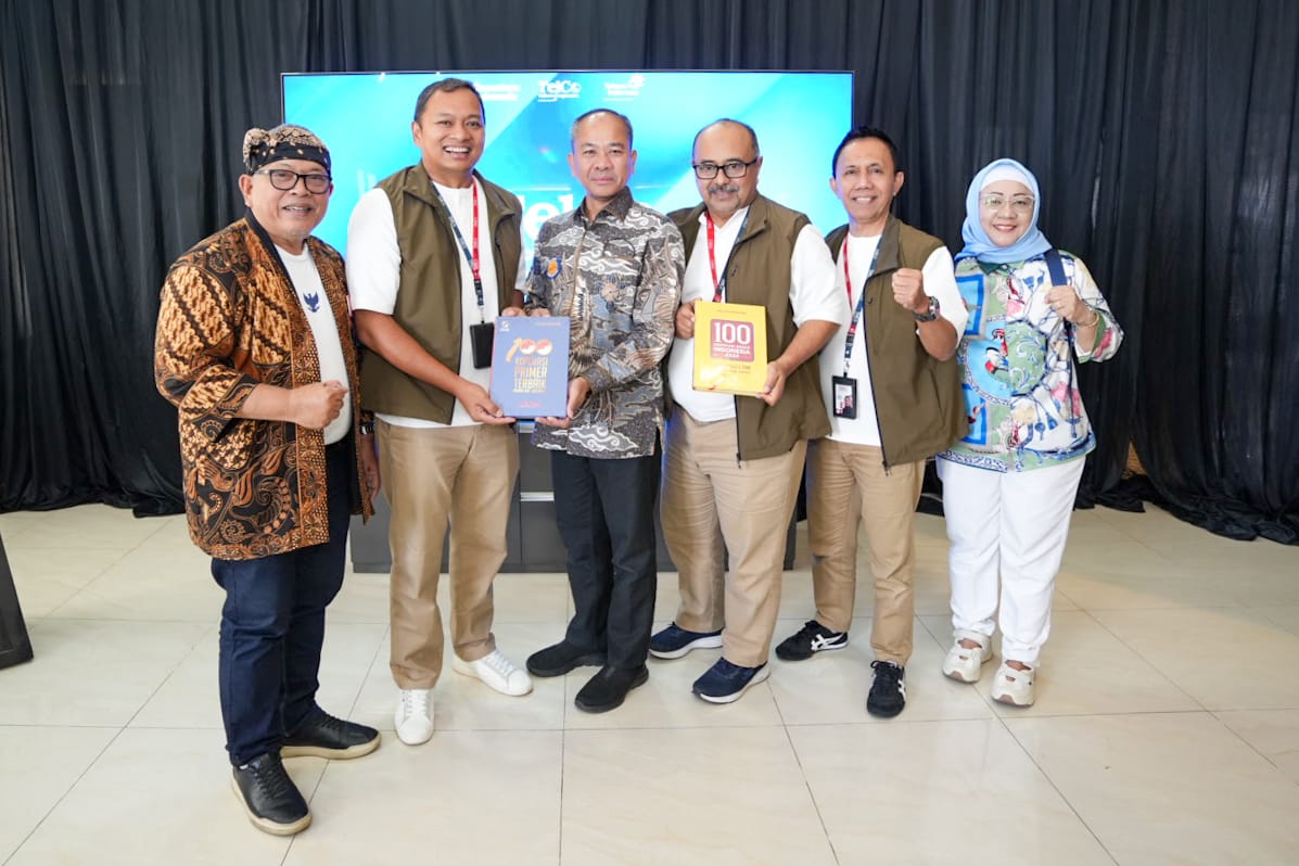 Pengurus PKPRI bersama Ketua Koperasi Telkom Ronaldi Amri dan Pemimpin Redaksi Majalah Peluang Irsyad Muchtar. Foto: Gema/Peluang.
